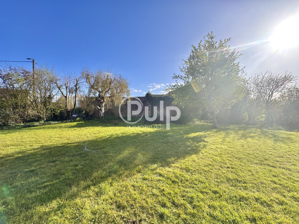 Terrain à bâtir - 877 m²
