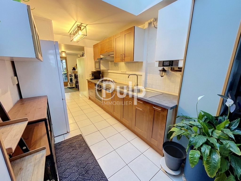Maison de ville 115 m2,  4 chambres avec beau jardin